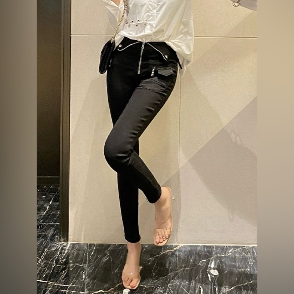 Women stylish black skinny jeans with zipper